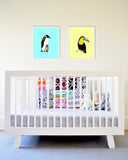 Blue Emperor Penguin Dad and Baby Art Print Hanging Over Baby Crib