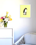 Yellow Emperor Penguin Dad and Baby Art Print in White Frame Hanging in Nursery